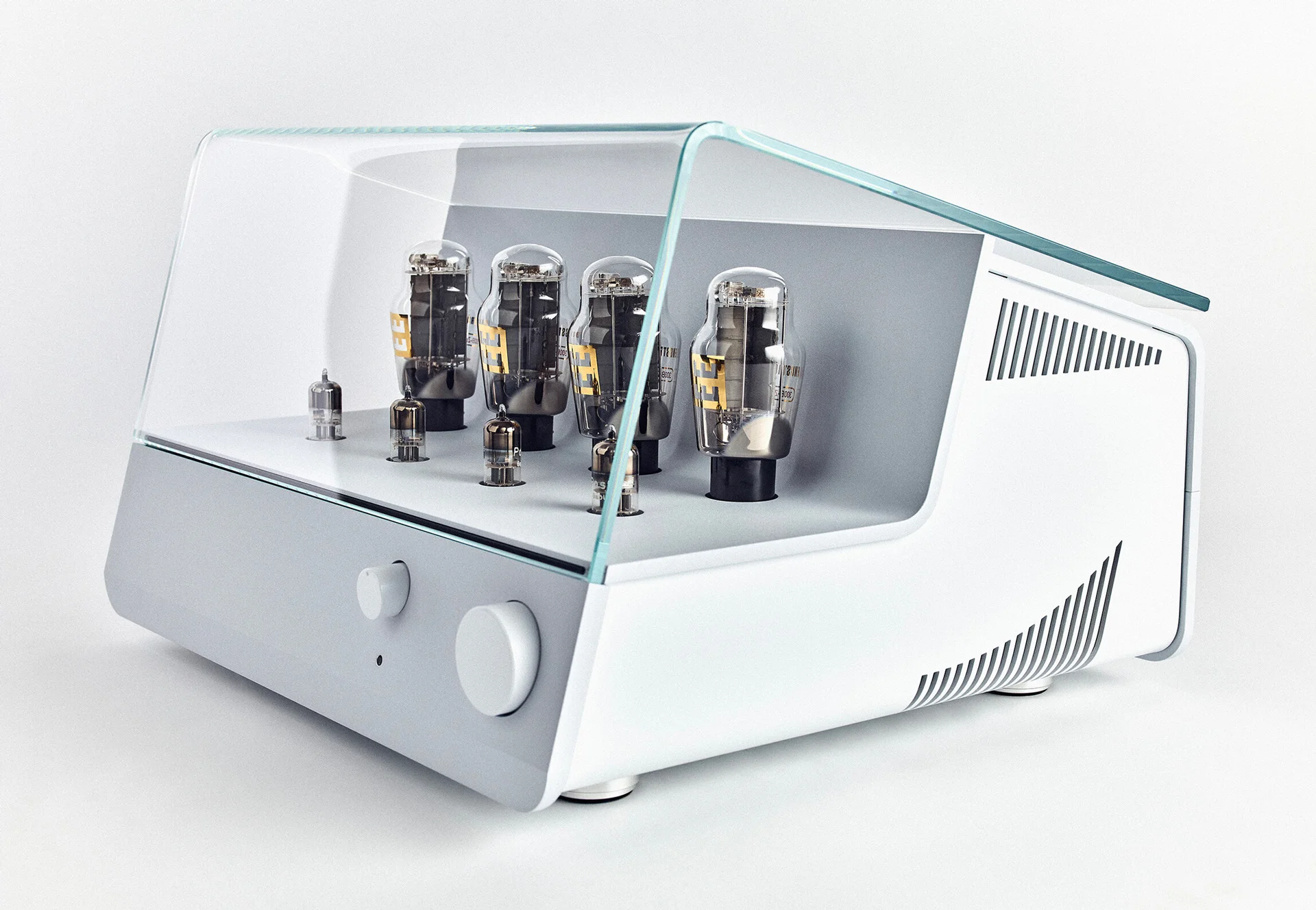 The Engstrom ARNE integrated amplifier pictured in white with clear cover.