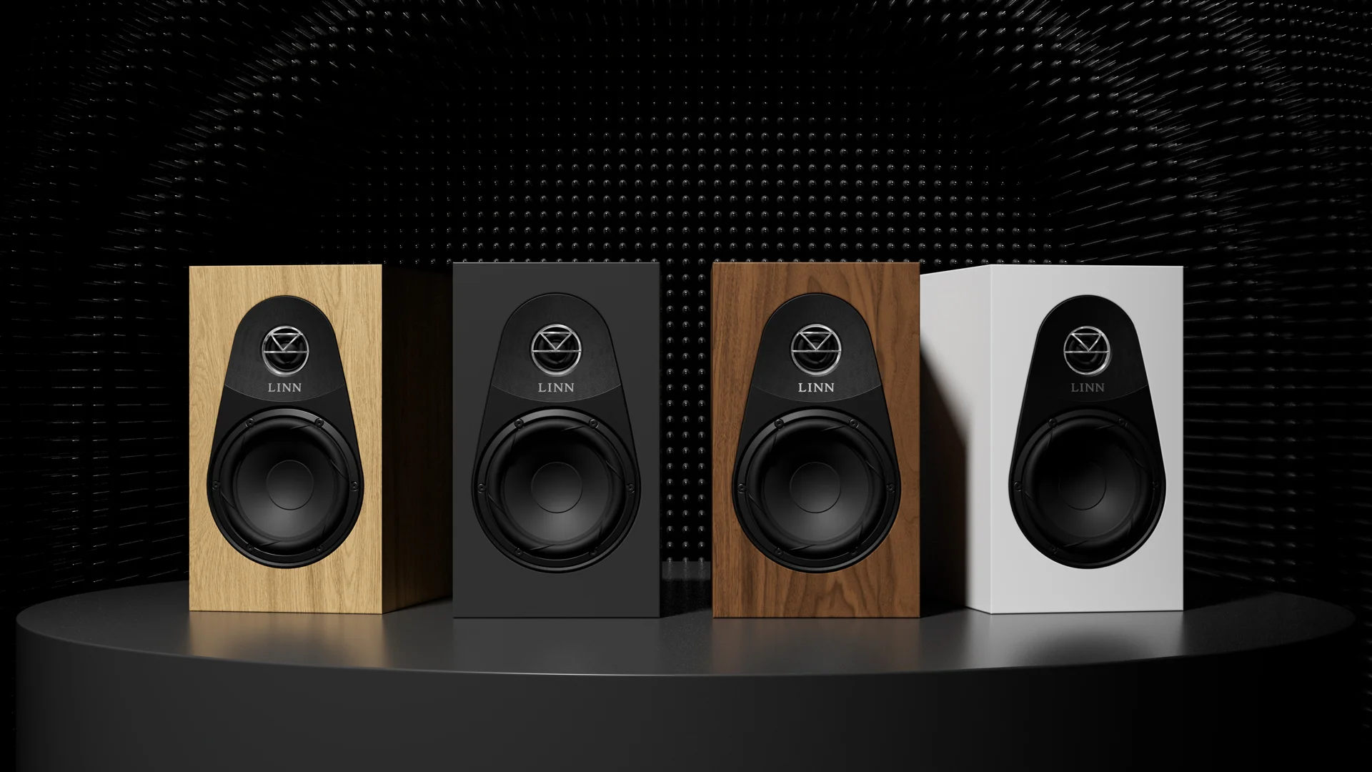 Linn 119 Bookshelf Speakers in a group shot of finishes