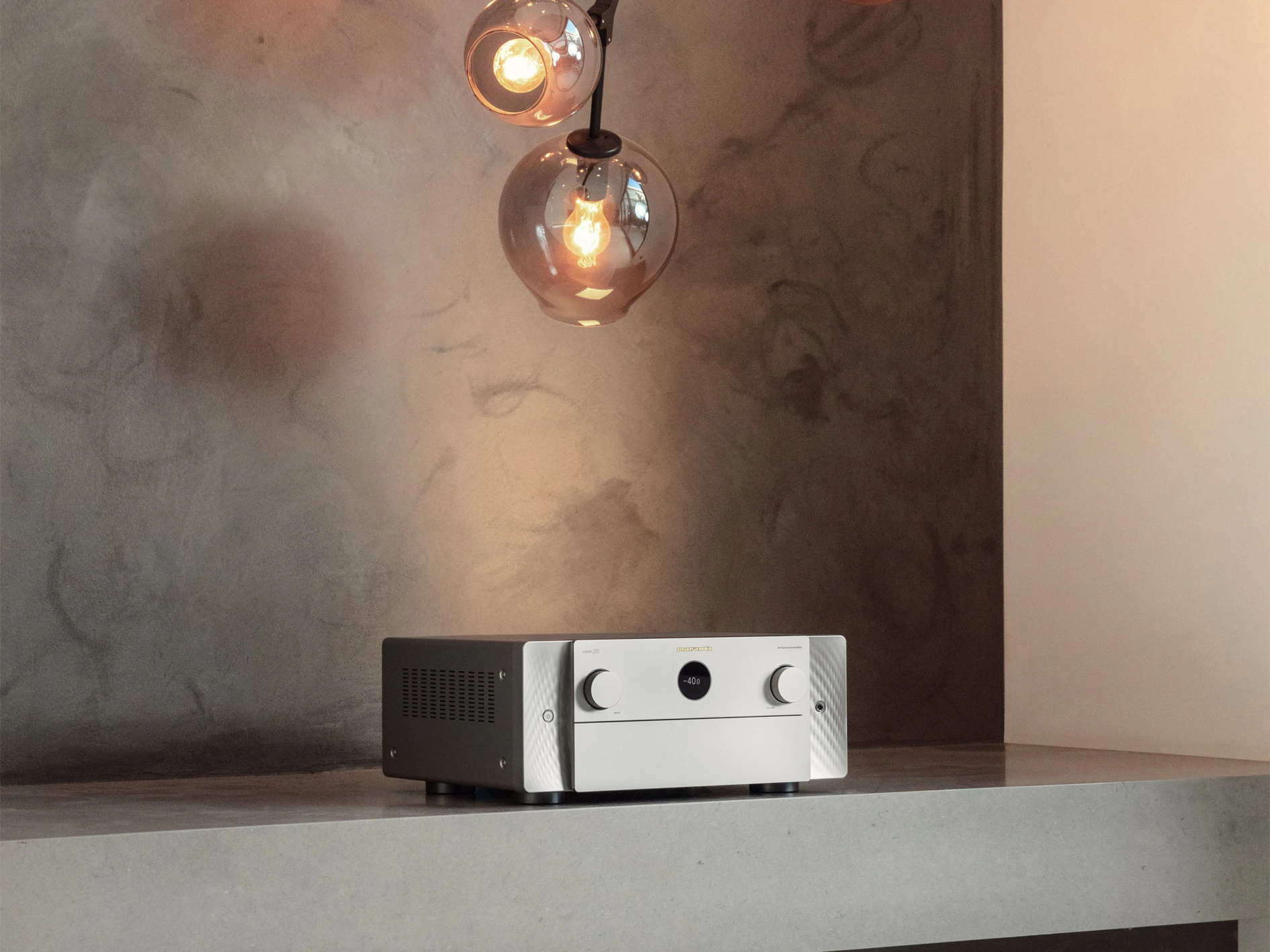 Marantz CINEMA 30 Silver lifestyle image on stone sideboard