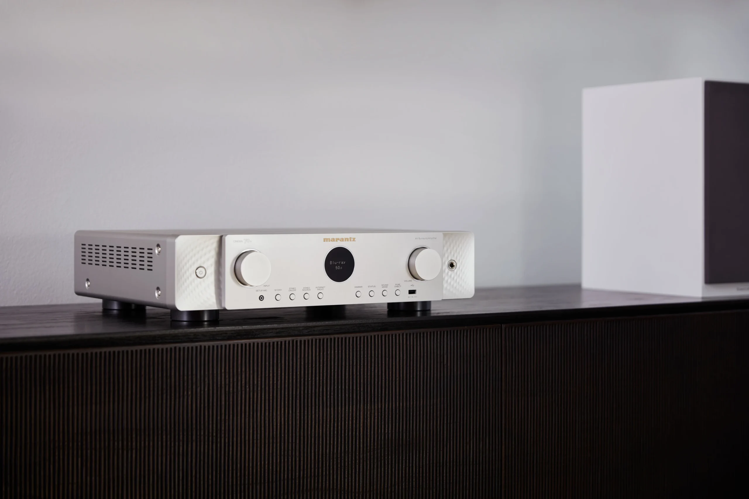 Marantz CINEMA 70 Lifestyle Silver Gold on Sideboard