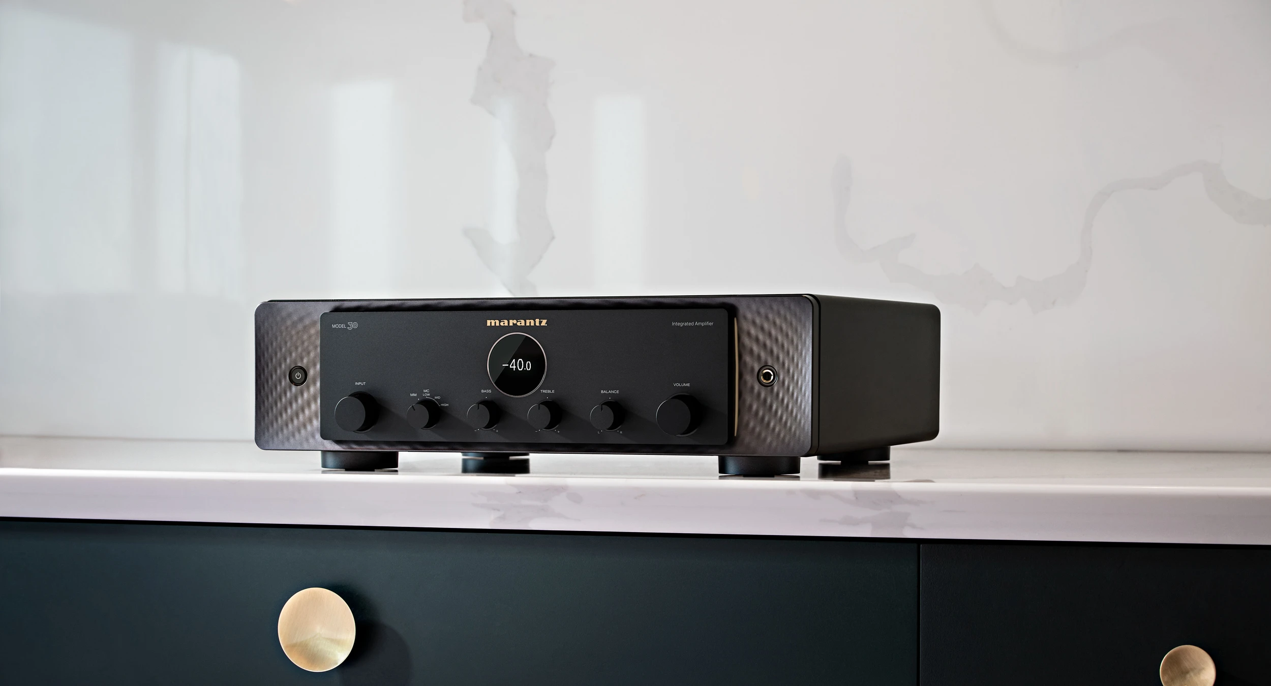 Marantz MODEL 30 Integrated Amplifier Lifestyle image on sideboard in black